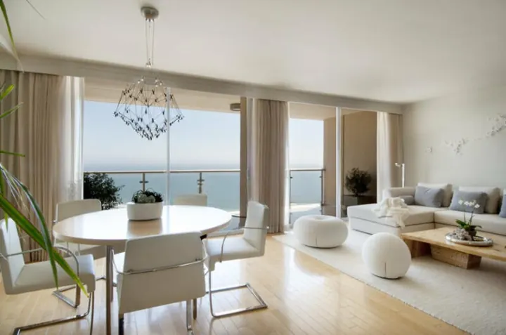 Fully furnished living and dining area with sea view at Clarissa Langkawi